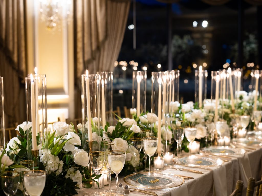 Close-up of a beautifully decorated long wedding table, perfect for an intimate celebration.